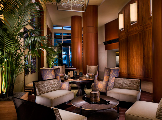Jatoba columns and Santos Rosewood feature wall in the reception lobby
