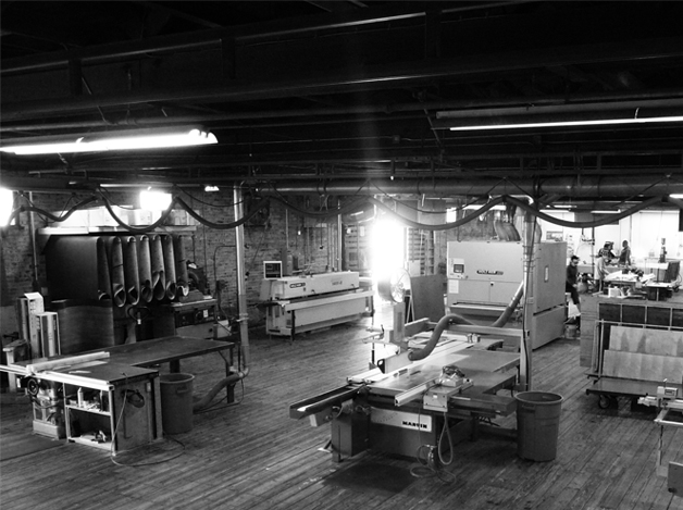 Woodworking machinery inside Akira's shop