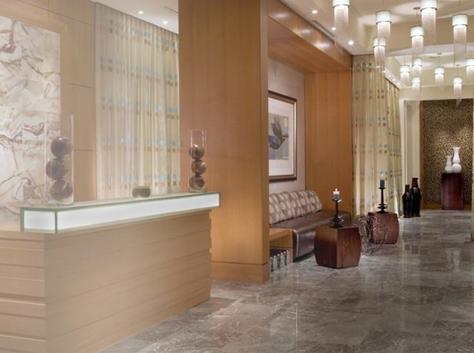 Light wood reception and spa corridor